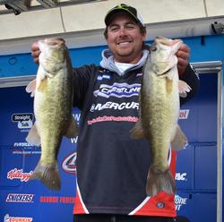John Cox holds up two Lake Hartwell largemouths that anchored his 18-pound, 13-ounce stringer.