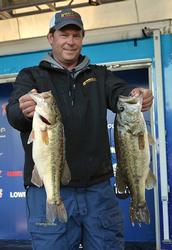 Co-angler David Redington smashed a 17-pound, 13-ounce limit Friday to take a sizeable lead with one day remaining. 
