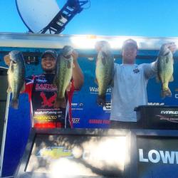 Nick Barr and Jarred Walker hold up their four biggest bass which carried them to a second place fish in the Western Invitational on Clear Lake. 