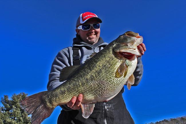 Gabe Keen poses with his giant bass from Lake Chickamauga. Photo courtesy of Richard Simms, www.ScenicCityFishing.com.