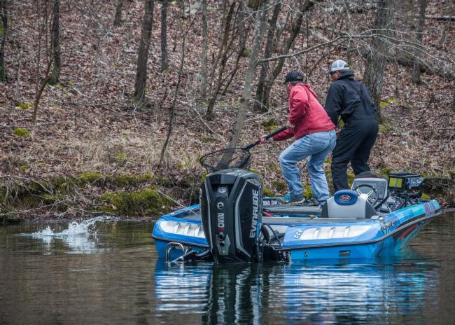 Evinrude pro Scott Martin fights one off a bed.
