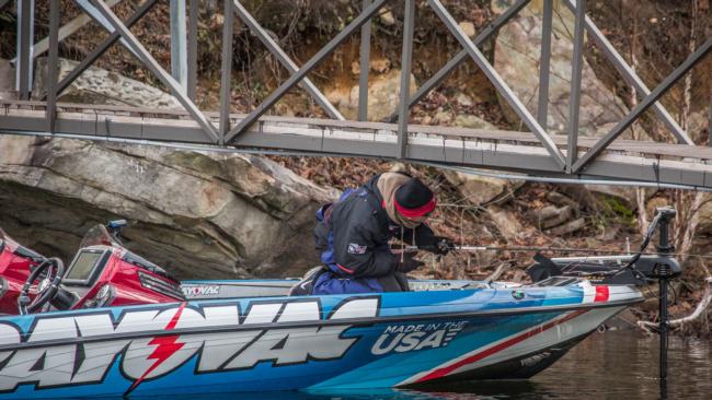 Clark Wendlandt chases a bass under a bridge. No obstacle is too big to overcome on the final day of competition at the Walmart FLW Tour on Lewis Smith Lake.