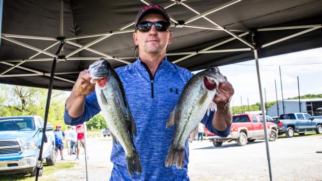 Co-angler Ryan Lejeune takes the day one lead with 12 pounds, 4 ounces on Lake Texoma. 