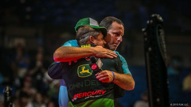 Shad Schenck shares an embrace with FLW Weighmaster Chris Jones after Schenck announced his retirement from fishing.