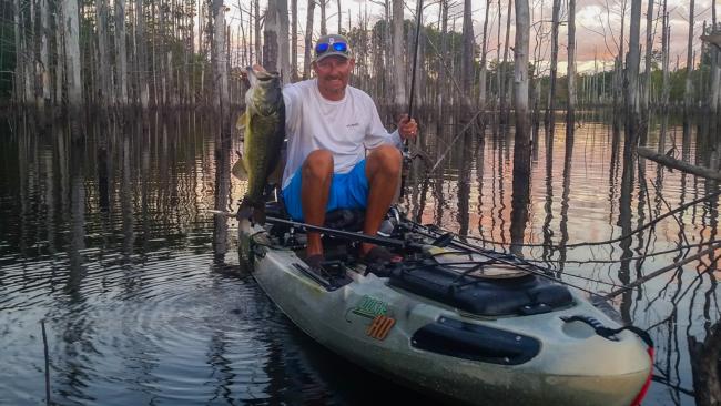 Only a kayak could get Wesley Strader in these backwaters to catch this monster bass. 
