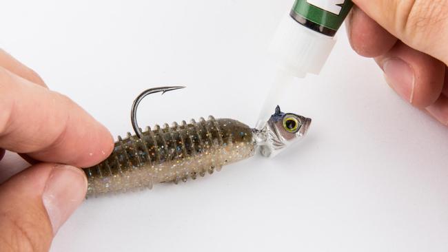 Super glue will help keep your soft plastics attached to your hooks. 