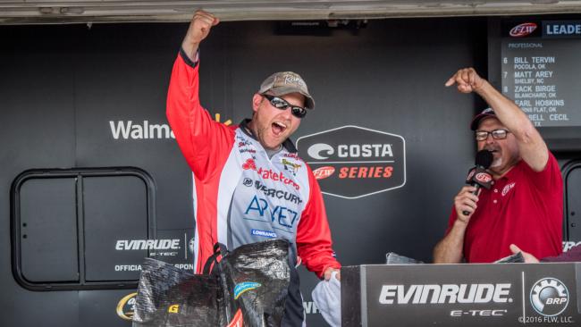 Meador celebrates taking the top prize on the co-angler side.